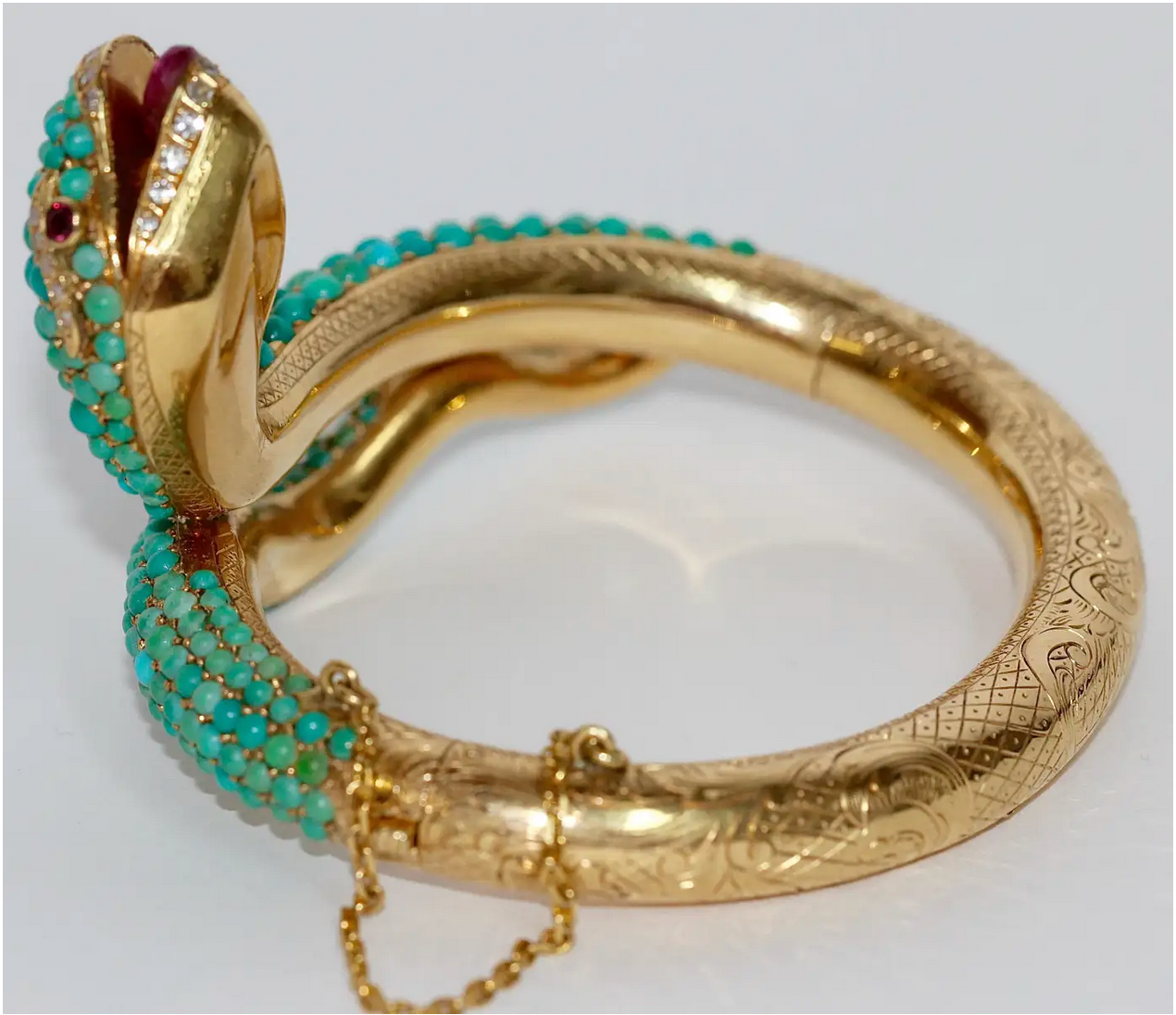 Prächtiger Schlangen-Reif Gelbgold mit Türkisen, Rubinen und Diamanten – um 1900