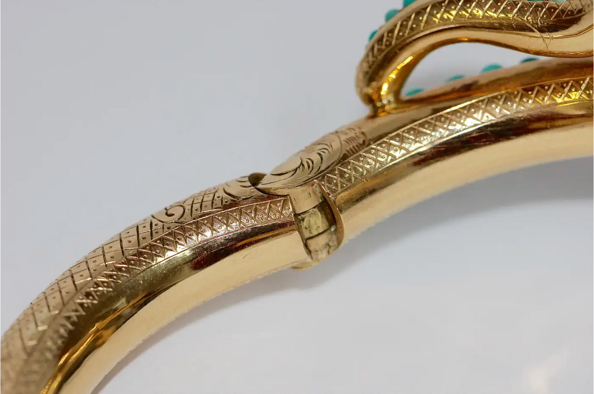 Prächtiger Schlangen-Reif Gelbgold mit Türkisen, Rubinen und Diamanten – um 1900