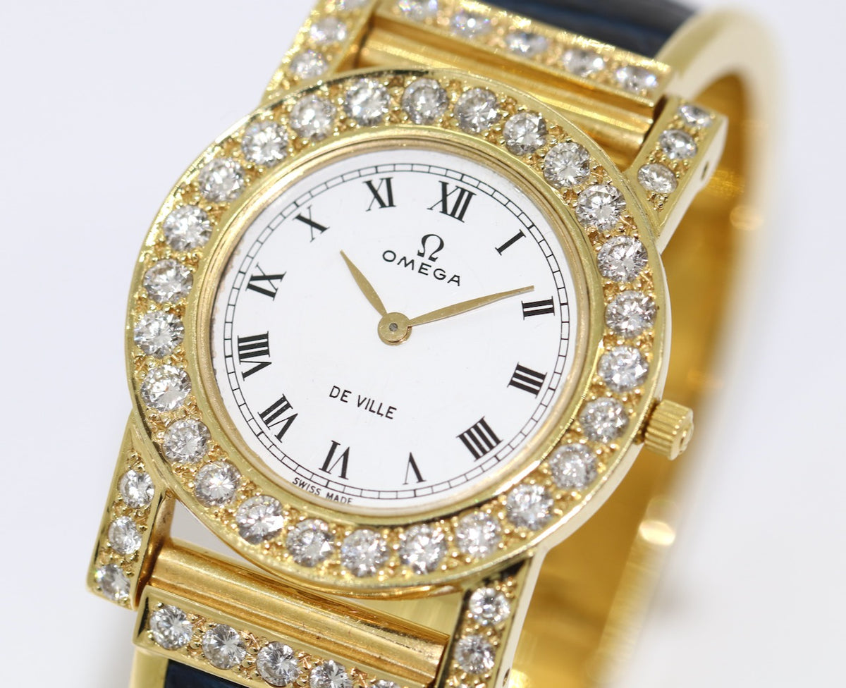 Omega De Ville Damenuhr in 18 Karat Gold und Diamanten
