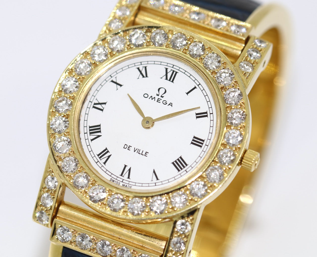 Omega De Ville Damenuhr in 18 Karat Gold und Diamanten