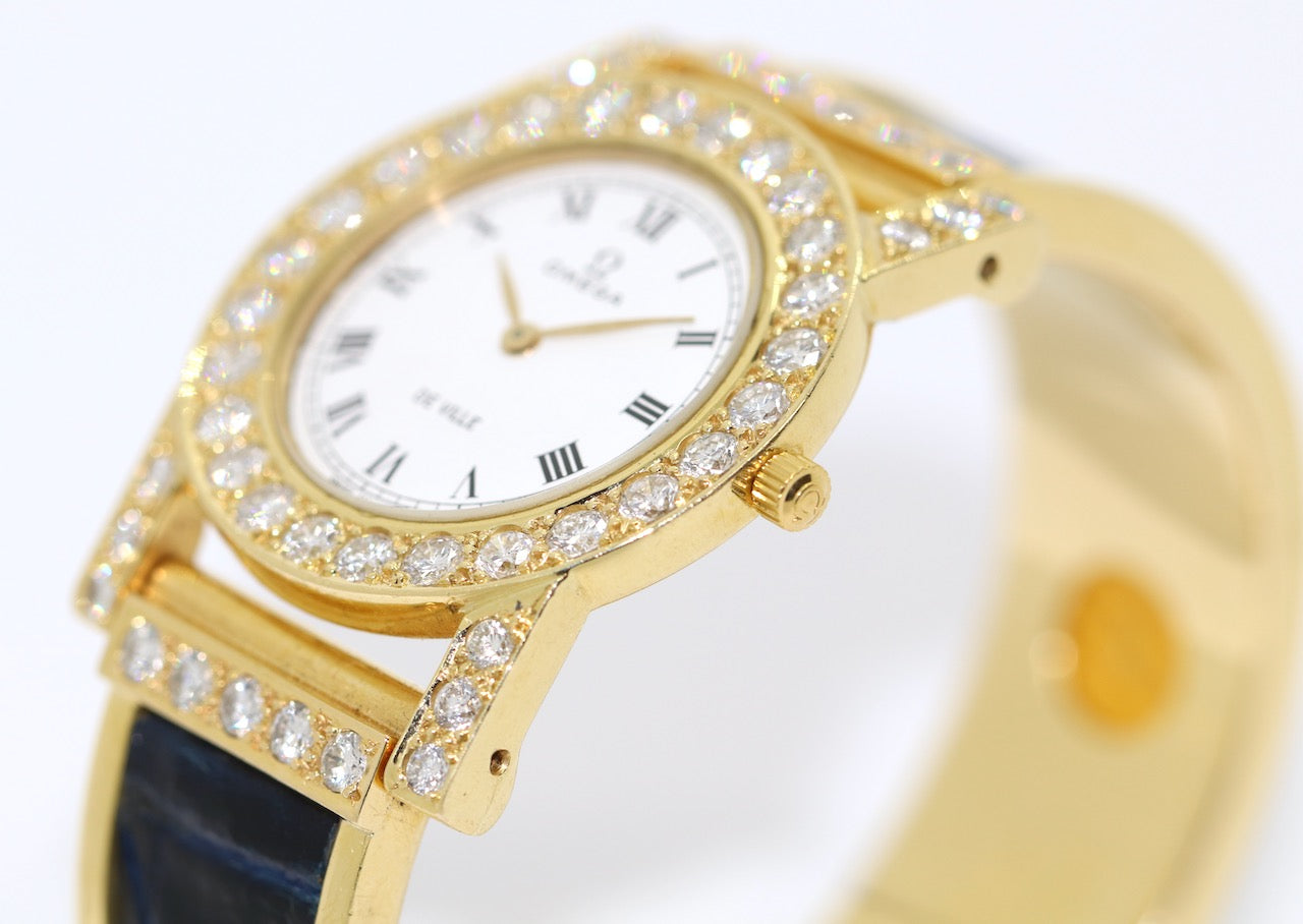 Omega De Ville Damenuhr in 18 Karat Gold und Diamanten