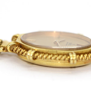 Ebel Damen-Anhängeruhr aus 18K Gelbgold mit Saphir-Cabochon