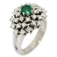 Ring aus 14 Karat Weißgold mit weißen Diamanten und Smaragd